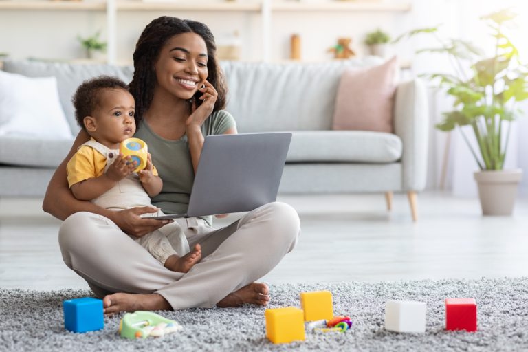 Remote Business Portrait Of Happy Black Woman With Baby Working